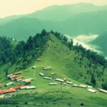 green mountains under sunny sky